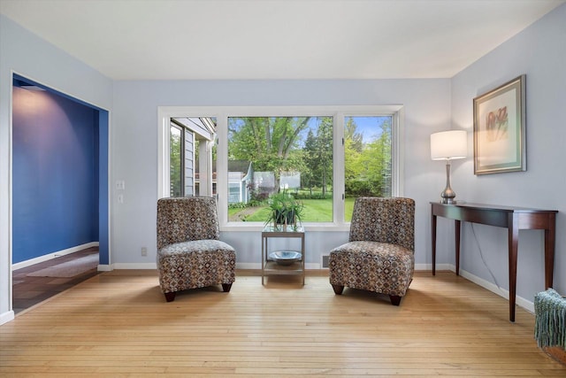 N60W39640 Mary Ln, Oconomowoc, WI 53066 - living area featuring hardwood / wood-style floors and baseboards