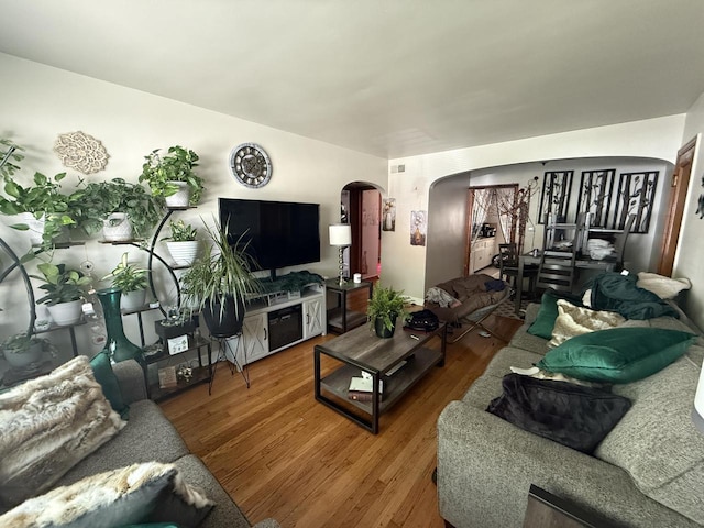2740 N 61st St, Milwaukee, WI 53210 - living area with arched walkways and wood finished floors