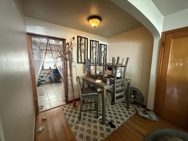 2740 N 61st St, Milwaukee, WI 53210 - dining room featuring arched walkways and wood finished floors