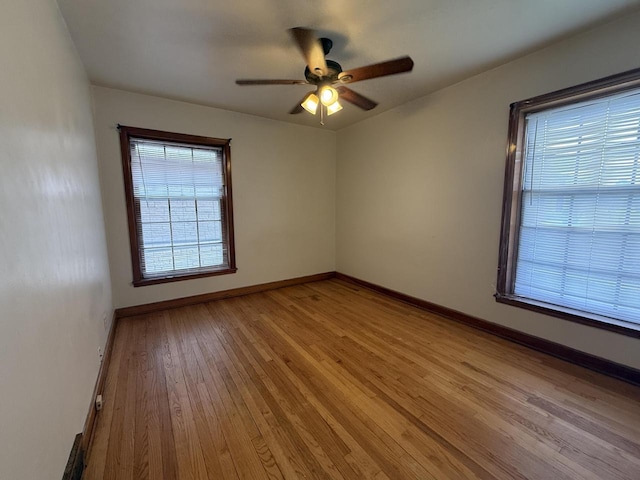 2740 N 61st St, Milwaukee, WI 53210 - empty room featuring a ceiling fan, light wood-type flooring, and baseboards