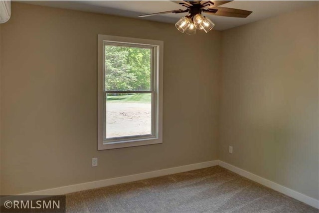 620 Pondhurst Dr, Amery, WI 54001 - empty room featuring carpet flooring, ceiling fan, and a wall unit AC