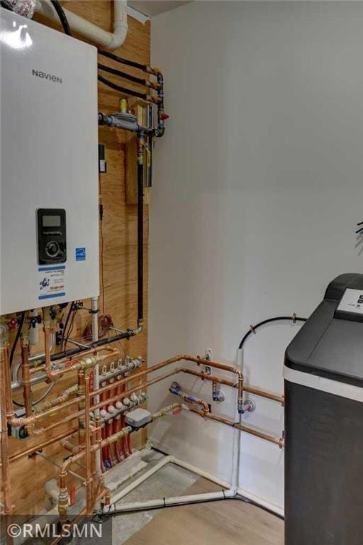 620 Pondhurst Dr, Amery, WI 54001 - utilities featuring tankless water heater