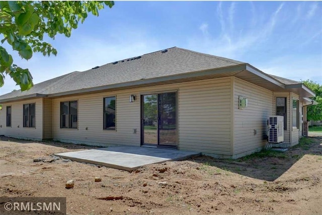 622 Pondhurst Dr, Amery, WI 54001 - rear view of house with a patio and roof with shingles