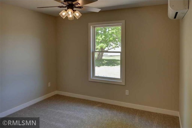 622 Pondhurst Dr, Amery, WI 54001 - empty room featuring a wall unit AC, carpet floors, and a ceiling fan