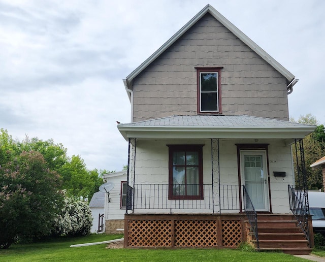 9524 W Mitchell St, West Allis, WI 53214 - view of front of home featuring a porch and a front lawn