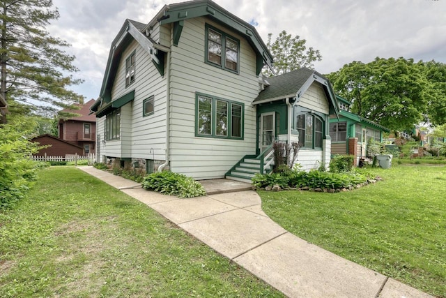 1551 N 50th St, Milwaukee, WI 53208 - view of front of property featuring a front yard