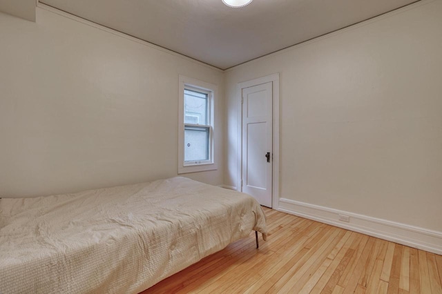1551 N 50th St, Milwaukee, WI 53208 - bedroom with hardwood / wood-style flooring and baseboards