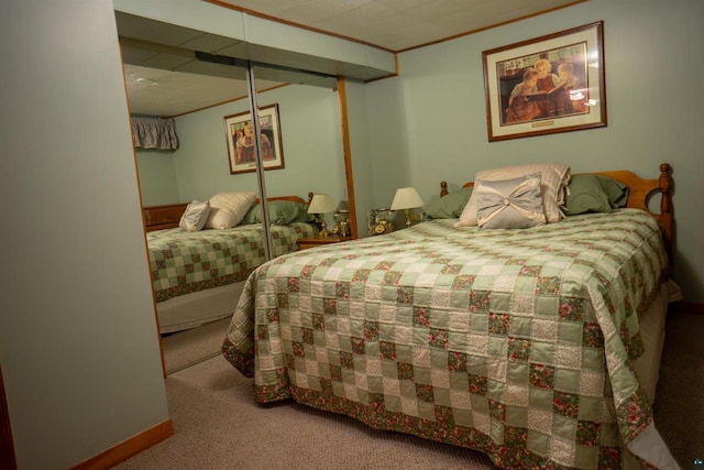 23920 US Highway 2, Ashland, WI 54806 - carpeted bedroom featuring ornamental molding and a closet