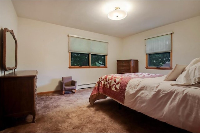 407 S Scott St, Elmwood, WI 54740 - carpeted bedroom with a baseboard heating unit and baseboards