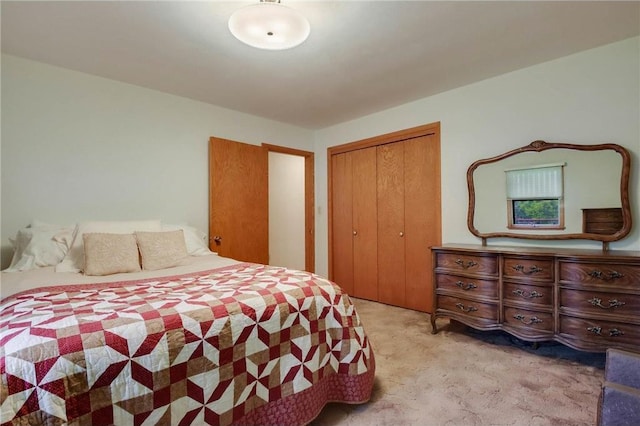 407 S Scott St, Elmwood, WI 54740 - bedroom featuring light colored carpet and a closet
