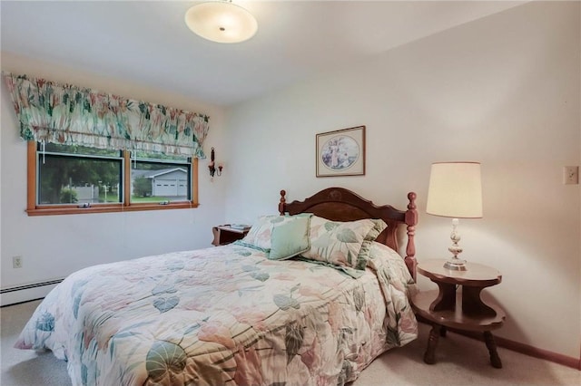 407 S Scott St, Elmwood, WI 54740 - bedroom featuring carpet, a baseboard radiator, and baseboards