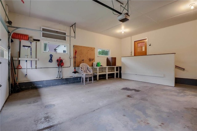 407 S Scott St, Elmwood, WI 54740 - garage featuring a garage door opener