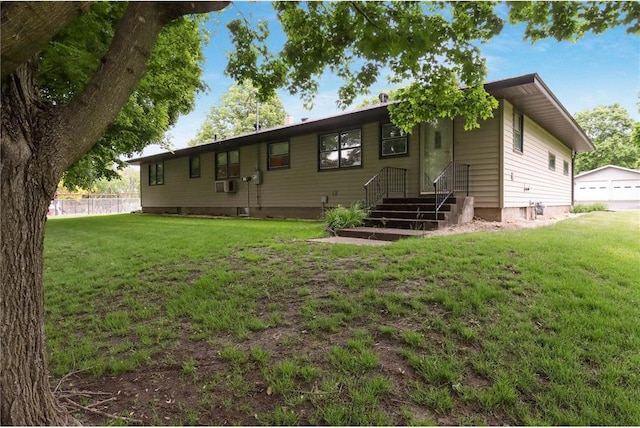 407 S Scott St, Elmwood, WI 54740 - rear view of house featuring a yard and a detached garage