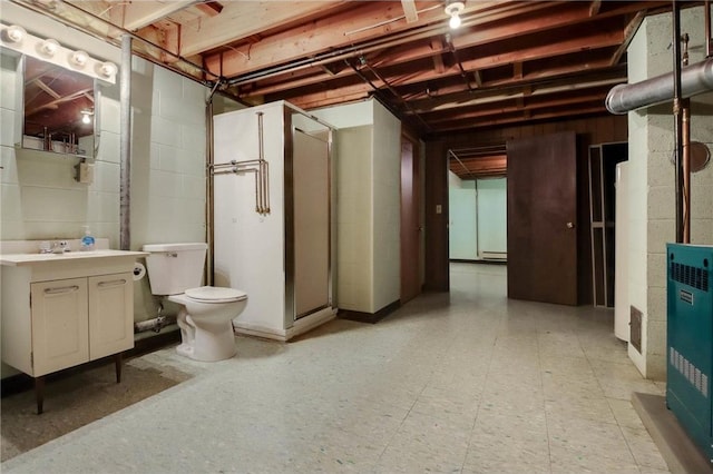 407 S Scott St, Elmwood, WI 54740 - unfinished below grade area featuring a baseboard radiator