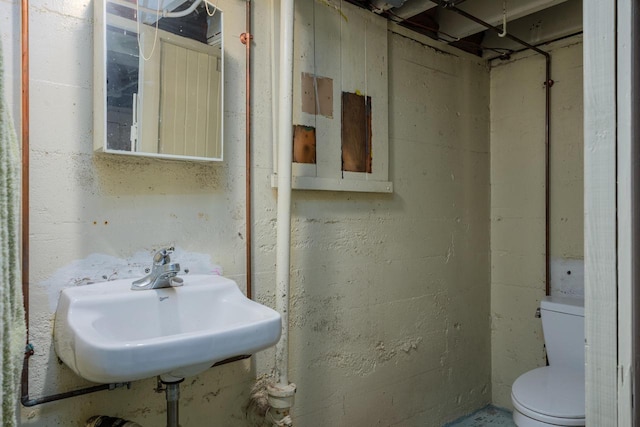 7312 5th Ave, Kenosha, WI 53143 - bathroom with toilet and a sink