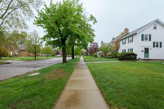 7312 5th Ave, Kenosha, WI 53143 - view of asphalt road with sidewalks and a residential view