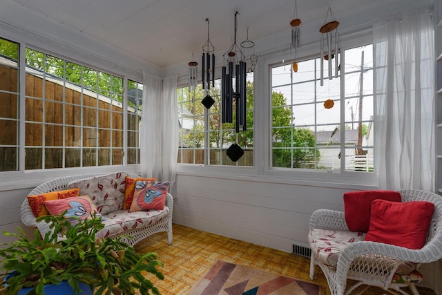 7312 5th Ave, Kenosha, WI 53143 - sunroom / solarium featuring plenty of natural light and tile patterned floors