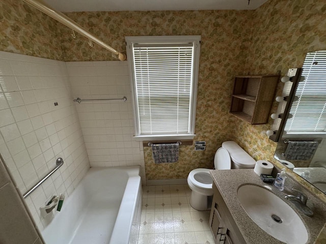 7715 18th Ave, Kenosha, WI 53143 - full bath featuring wallpapered walls, vanity, toilet, and baseboards