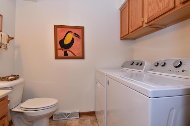 10320 W Whitnall Edge Cir Unit A, Franklin, WI 53132 - washroom featuring washer and clothes dryer and baseboards