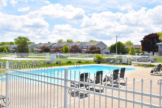 10320 W Whitnall Edge Cir Unit A, Franklin, WI 53132 - community pool featuring a residential view and a patio area