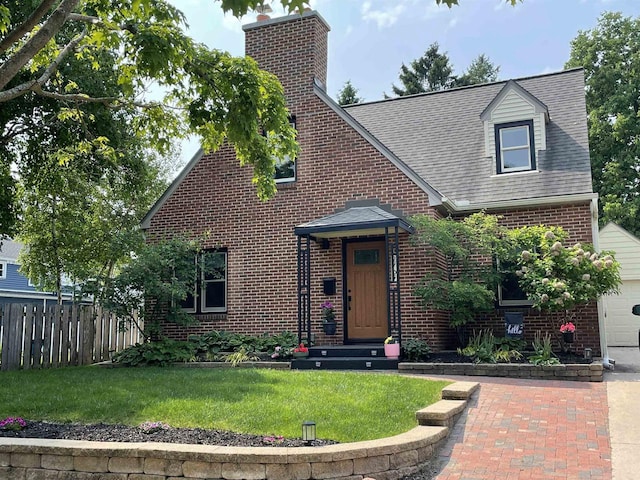 2707 Mason St, Madison, WI 53705 - view of front of property featuring brick siding, a chimney, and a shingled roof