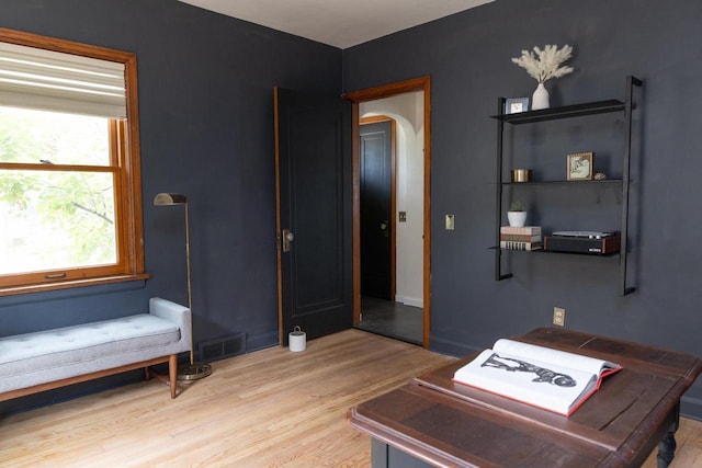 2707 Mason St, Madison, WI 53705 - home office featuring light wood-type flooring and arched walkways