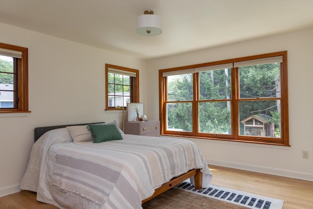 2707 Mason St, Madison, WI 53705 - bedroom featuring light wood-style floors and baseboards