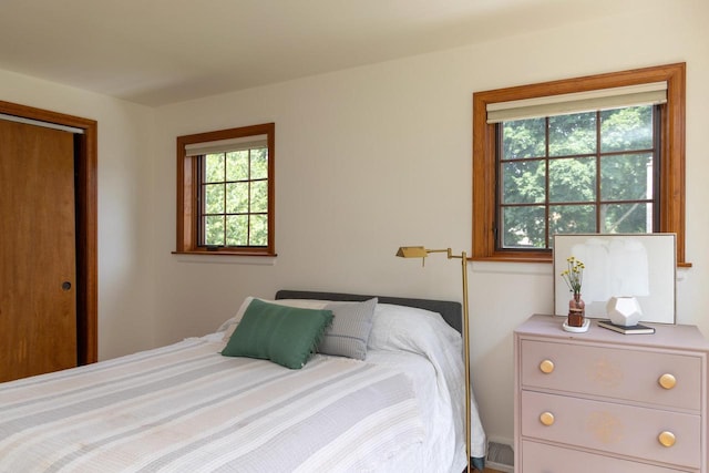 2707 Mason St, Madison, WI 53705 - bedroom with multiple windows and a closet