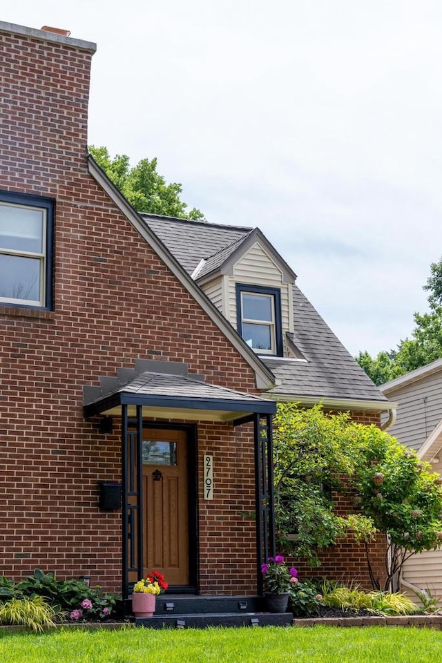2707 Mason St, Madison, WI 53705 - view of exterior entry featuring brick siding