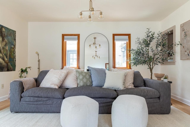 2707 Mason St, Madison, WI 53705 - living area with wood finished floors and a chandelier