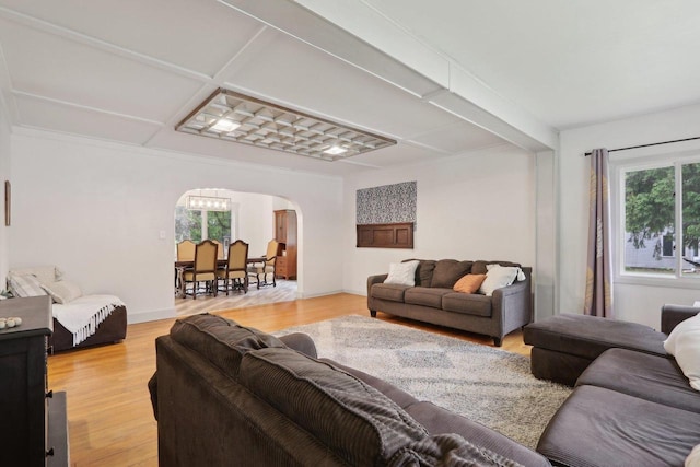 N62W23527 Sliver Spring Dr, Sussex, WI 53089 - living area with arched walkways and light wood-style floors