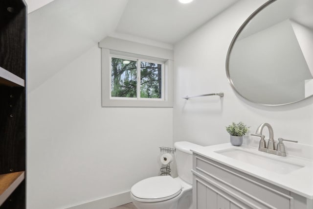 N62W23527 Sliver Spring Dr, Sussex, WI 53089 - bathroom with vanity, toilet, and baseboards