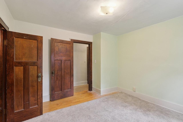 N62W23527 Sliver Spring Dr, Sussex, WI 53089 - unfurnished bedroom with light colored carpet and baseboards