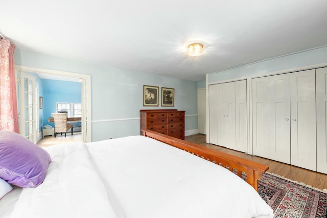 529 N 68th St, Wauwatosa, WI 53213 - bedroom with multiple closets and wood finished floors