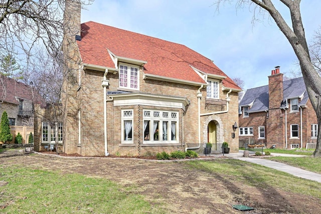 529 N 68th St, Wauwatosa, WI 53213 - view of front of home with a chimney and brick siding