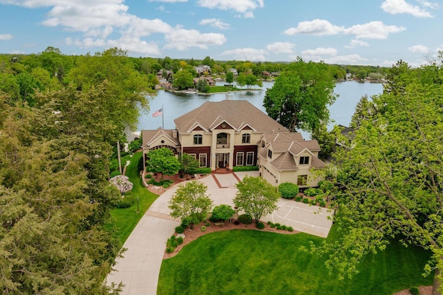 N49W35398 Wisconsin Ave, Oconomowoc, WI 53066 - view from above of property featuring a large body of water and a tree filled landscape
