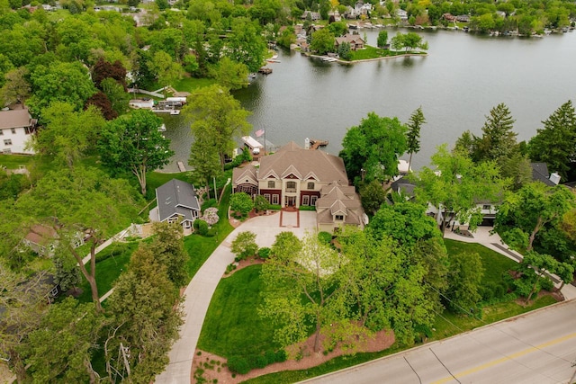 N49W35398 Wisconsin Ave, Oconomowoc, WI 53066 - bird's eye view of a large body of water and a tree filled landscape