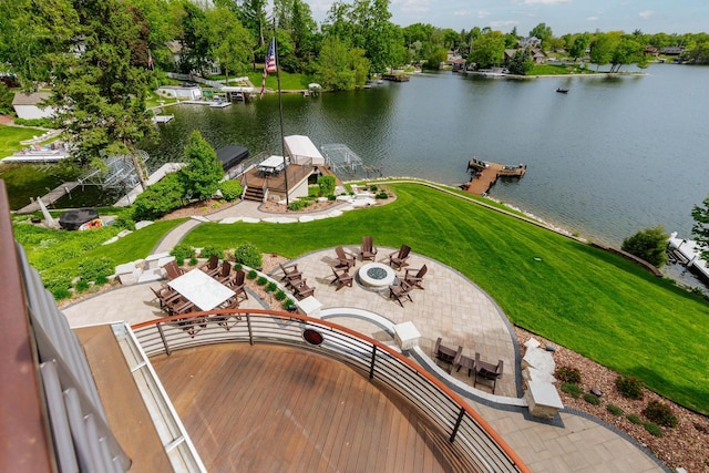 N49W35398 Wisconsin Ave, Oconomowoc, WI 53066 - aerial view of a large body of water and a tree filled landscape