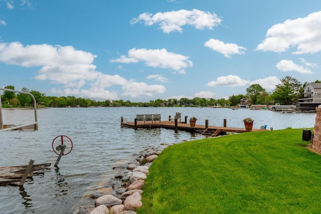 N49W35398 Wisconsin Ave, Oconomowoc, WI 53066 - dock area featuring a water view and a lawn