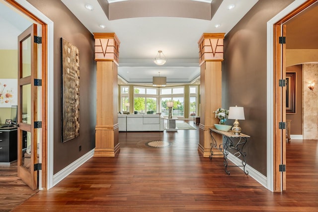 N49W35398 Wisconsin Ave, Oconomowoc, WI 53066 - corridor featuring wood finished floors, arched walkways, baseboards, recessed lighting, and ornate columns