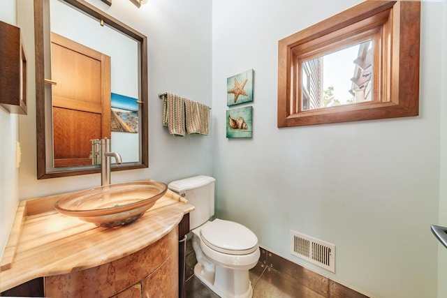 N49W35398 Wisconsin Ave, Oconomowoc, WI 53066 - half bathroom with vanity and toilet