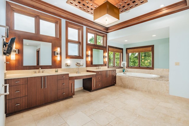 N49W35398 Wisconsin Ave, Oconomowoc, WI 53066 - full bath featuring a garden tub, two vanities, and ornamental molding