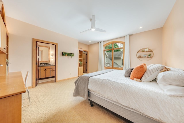 N49W35398 Wisconsin Ave, Oconomowoc, WI 53066 - bedroom with light colored carpet, ensuite bath, a ceiling fan, recessed lighting, and baseboards
