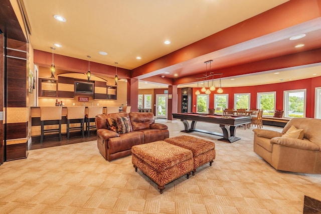 N49W35398 Wisconsin Ave, Oconomowoc, WI 53066 - living room with recessed lighting, pool table, carpet flooring, and healthy amount of natural light
