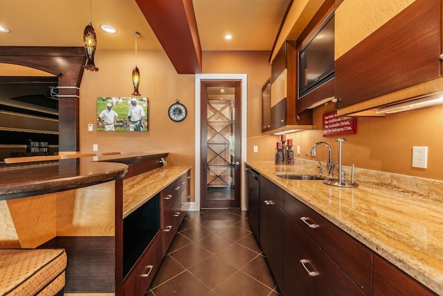 N49W35398 Wisconsin Ave, Oconomowoc, WI 53066 - indoor wet bar featuring dark tile patterned floors, decorative light fixtures, black dishwasher, and recessed lighting