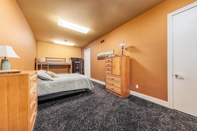 N49W35398 Wisconsin Ave, Oconomowoc, WI 53066 - bedroom with dark colored carpet and baseboards