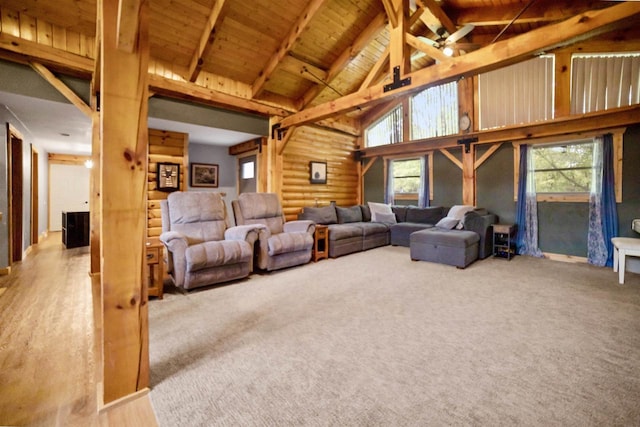 29774 Whispering Pines Rd, Lone Rock, WI 53556 - living room featuring high vaulted ceiling, wood ceiling with exposed beams, and carpet floors