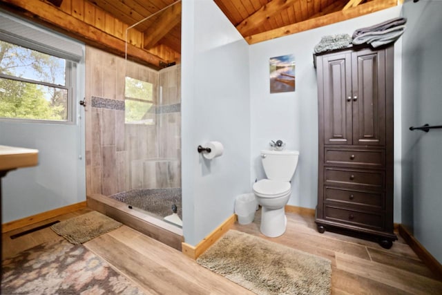 29774 Whispering Pines Rd, Lone Rock, WI 53556 - full bath with wooden ceiling with exposed beams, tiled shower, wood finished floors, toilet, and baseboards