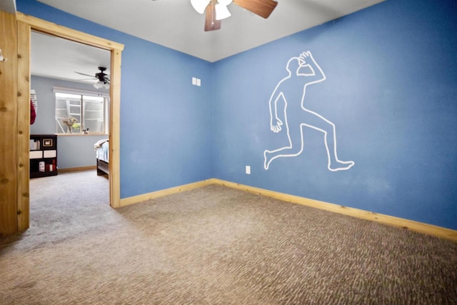 29774 Whispering Pines Rd, Lone Rock, WI 53556 - empty room featuring a ceiling fan, carpet, and baseboards
