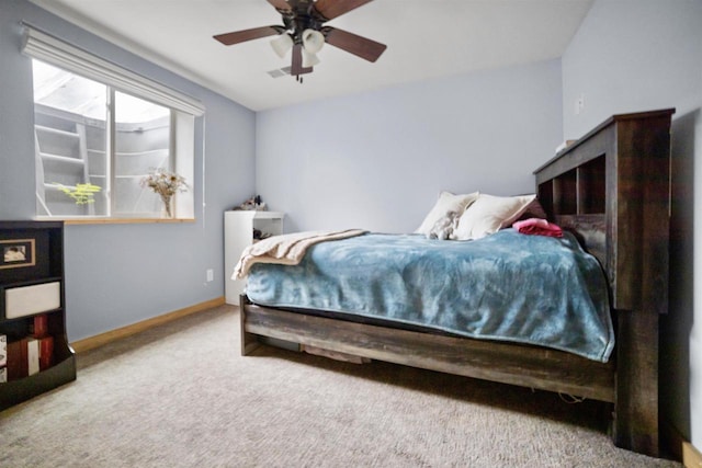 29774 Whispering Pines Rd, Lone Rock, WI 53556 - carpeted bedroom featuring baseboards and ceiling fan